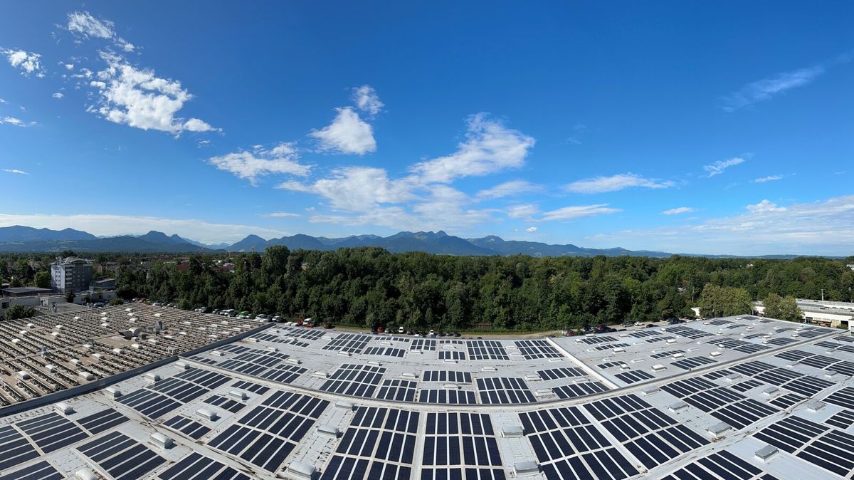Ericsson antenna production site in Rosenheim, Germany, framed by forest and mountains